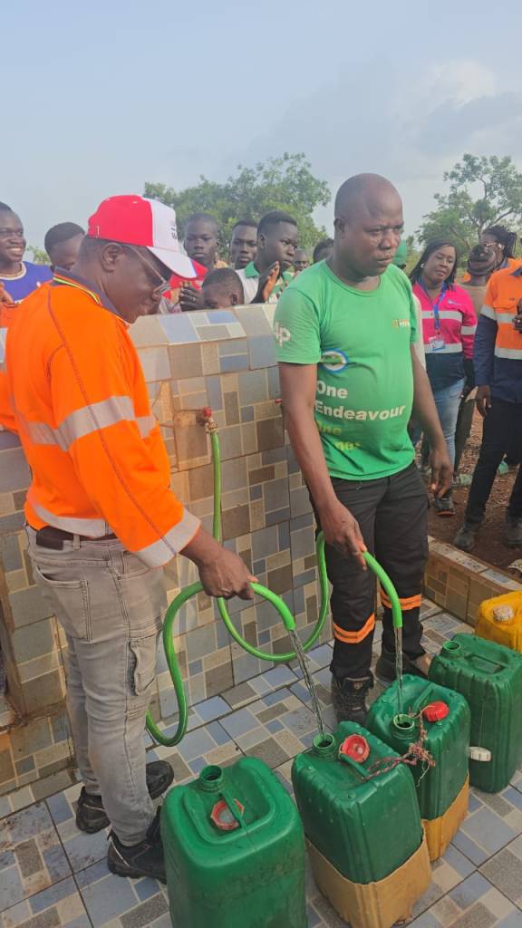 Villagers in Pani, Burkina Faso, collect clean water from the new Pamicor borehole